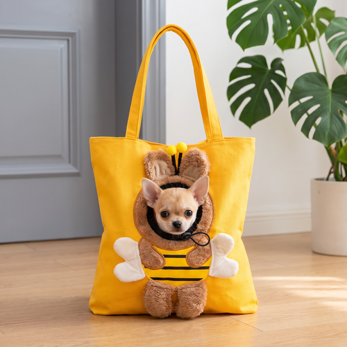 Chihuahua puppy peeking out of the yellow bee pup tote